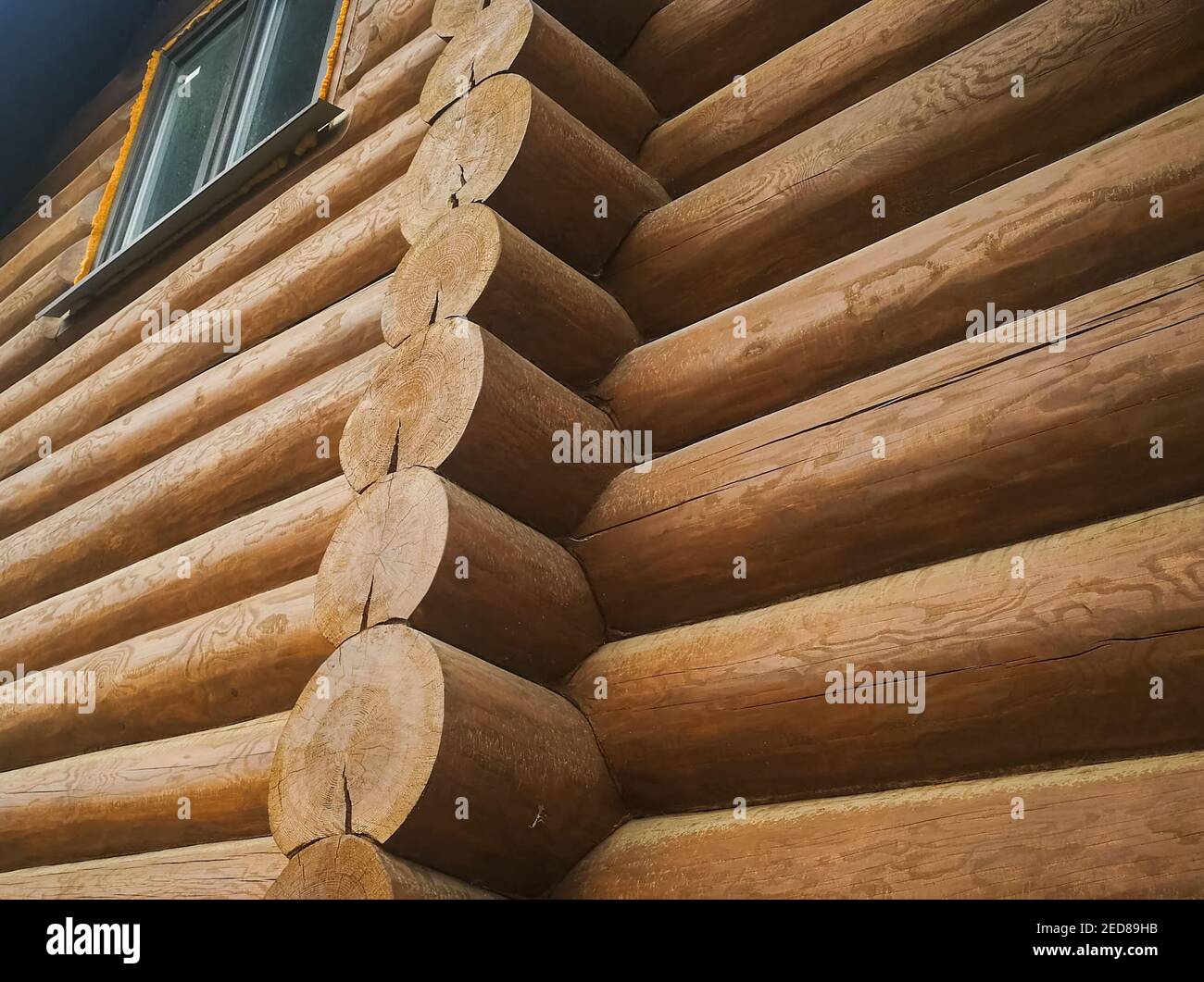 Details and elements of a wooden house made of timber. The construction