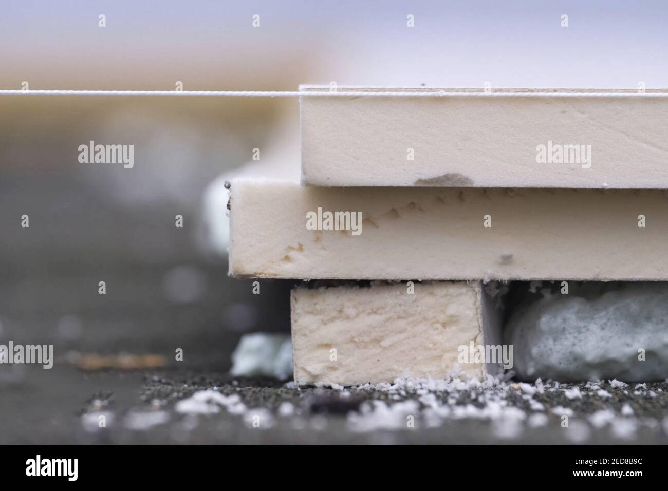 Roofing insulation, installation of insulation sheets on foam. Foam and