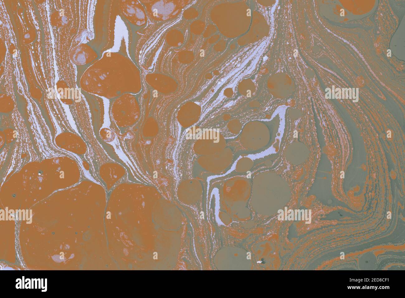 An abstract illustration of pastel orange and green toned fluid