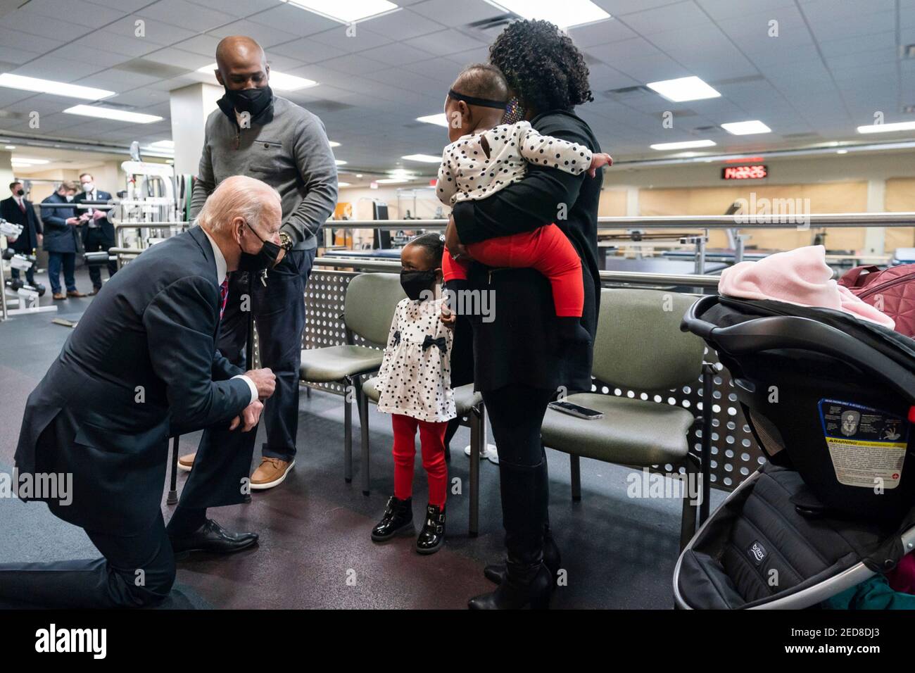 U.S President Joe Biden greets Ret. U.S. Army Sgt. Peter Francis, his wife Carren, and their daughters Morgan and Kamryn during a visit to Walter Reed National Military Medical Center January 29, 2021 in Bethesda, Maryland. Sgt. Francis was injured in May of 2013 while deployed to Afghanistan where he suffered a gunshot wound to his spine with residual nerve damage to his right leg. Stock Photo