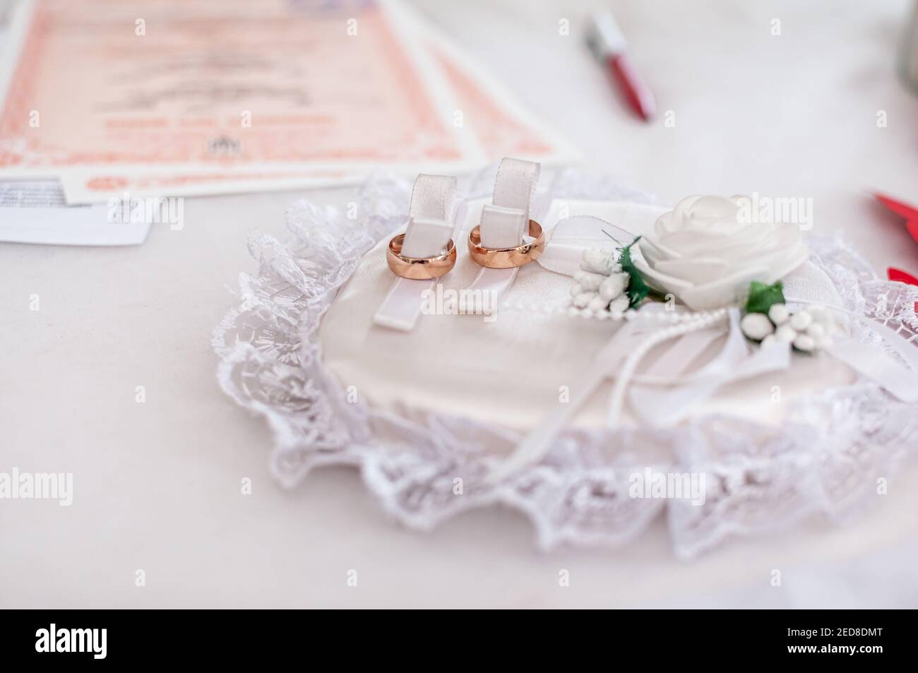 Wedding rings on a stand. wedding ceremony Stock Photo - Alamy