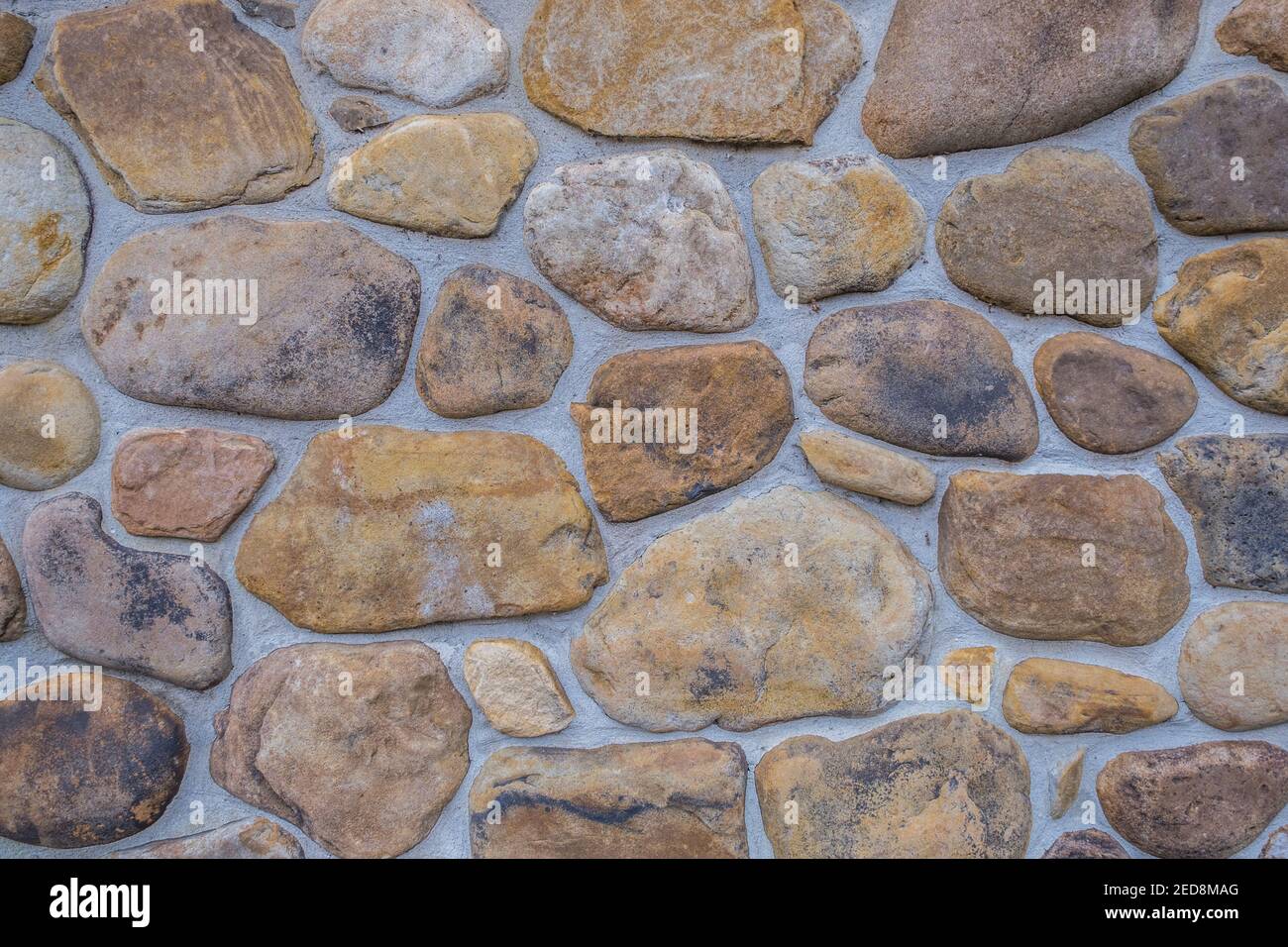 Can I mortar between the river stones? The stones are slightly