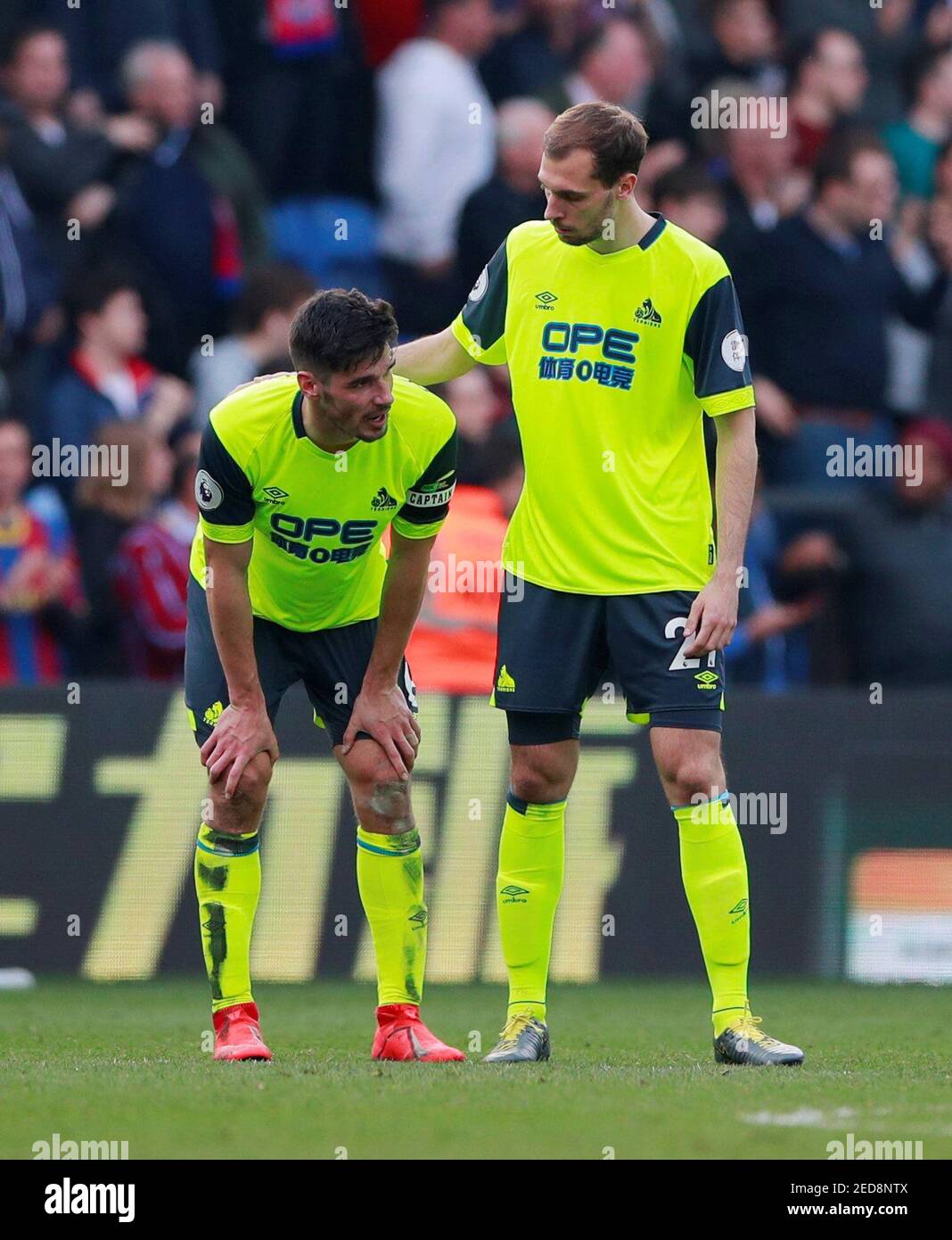 Soccer Football - Premier League - Crystal Palace v Huddersfield Town - Selhurst Park, London, Britain - March 30, 2019  Huddersfield Town's Christopher Schindler and Jon Gorenc Stankovic look dejected after the match as they are relegated from the Premier League   Action Images via Reuters/Andrew Couldridge  EDITORIAL USE ONLY. No use with unauthorized audio, video, data, fixture lists, club/league logos or 'live' services. Online in-match use limited to 75 images, no video emulation. No use in betting, games or single club/league/player publications.  Please contact your account representati Stock Photo