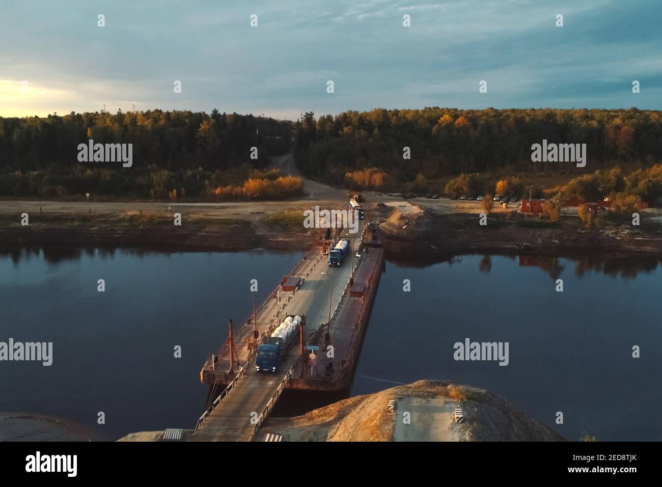 Prefabricated pontoon across the river. Temporary crossing the river ...