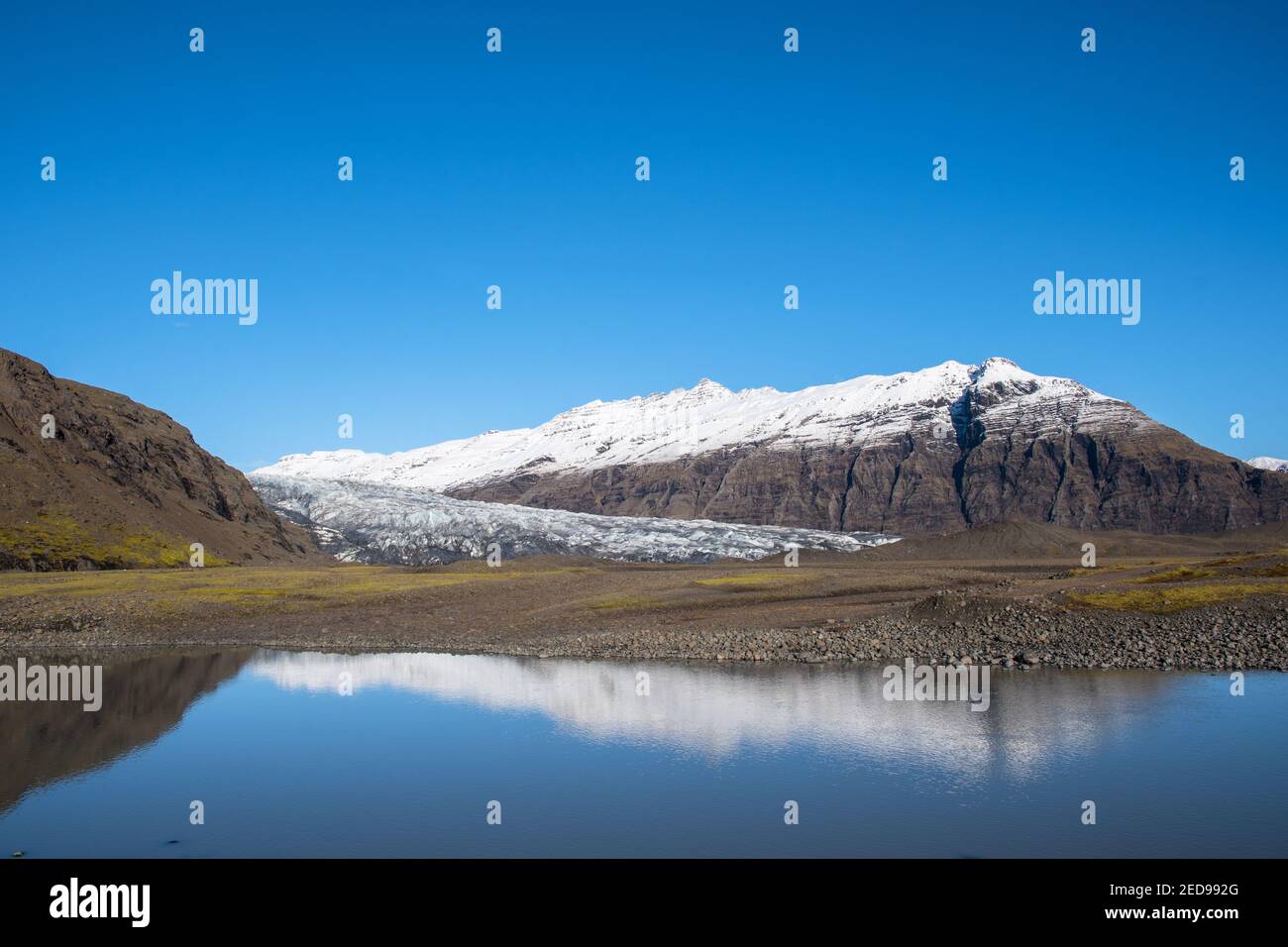 River Holmsa, Glacier Flaajokull and mountain and Flafjall mountain on a summer day in south Iceland Stock Photo