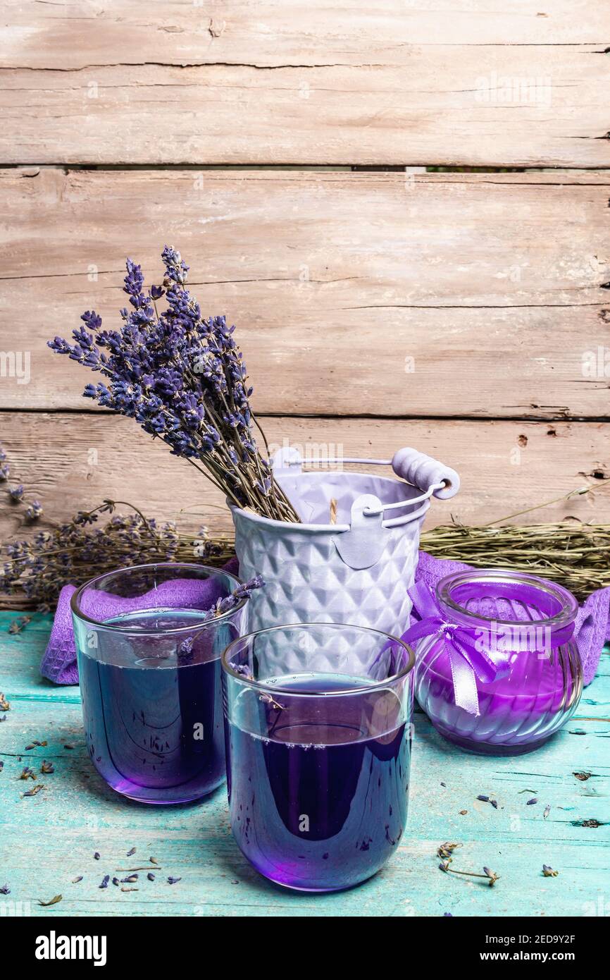 Glass jar of dry lavender flowers for making herbal tea, bunches of dry  lavender. Jars of different dry medicinal herbs on table. Alternative  medicine Stock Photo - Alamy