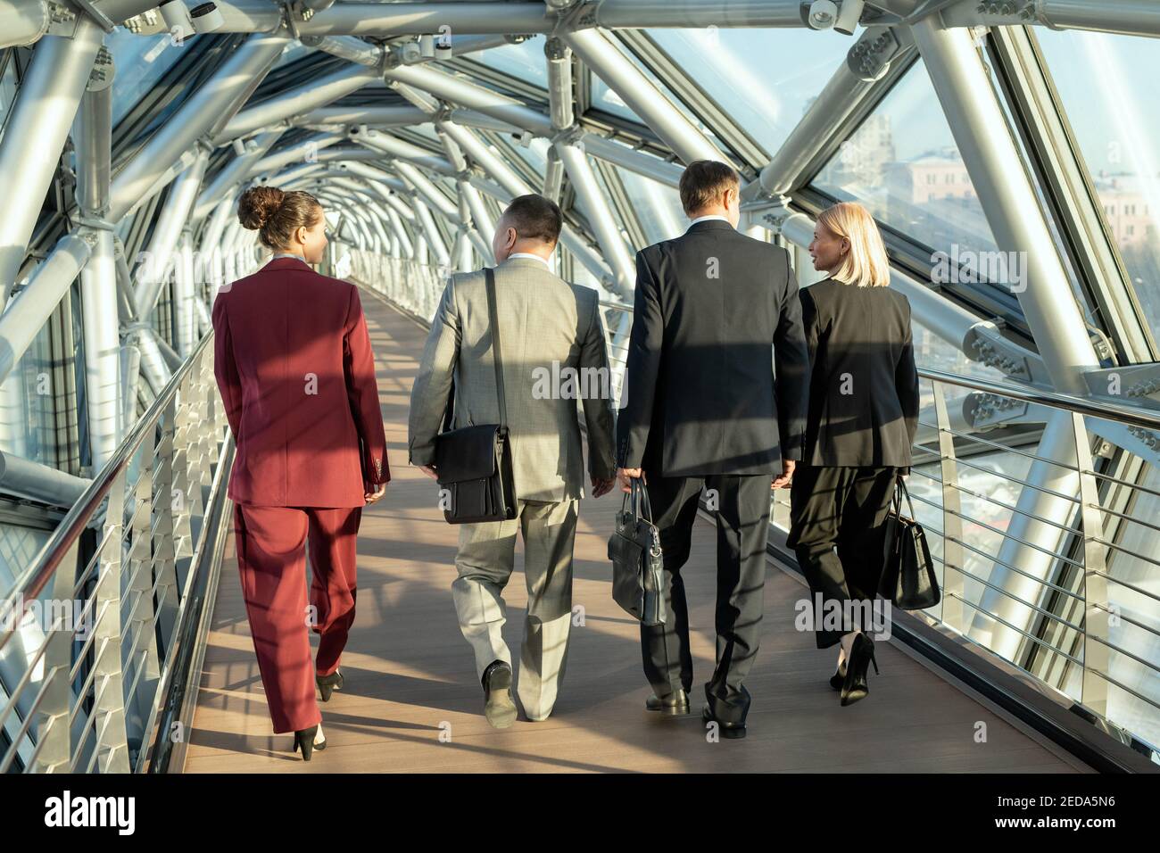 Walking group of men in suits hi-res stock photography and images - Alamy