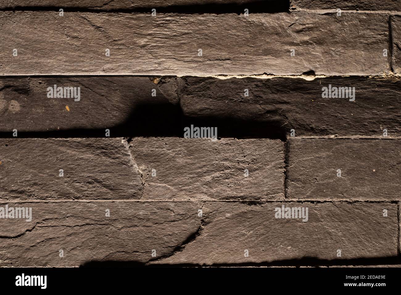 Dark stony tiles as a background Stock Photo