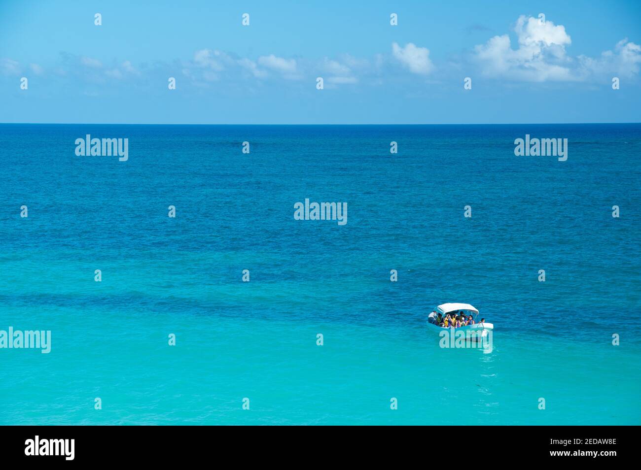 A boat on the water at Tulum, Mexico Stock Photo