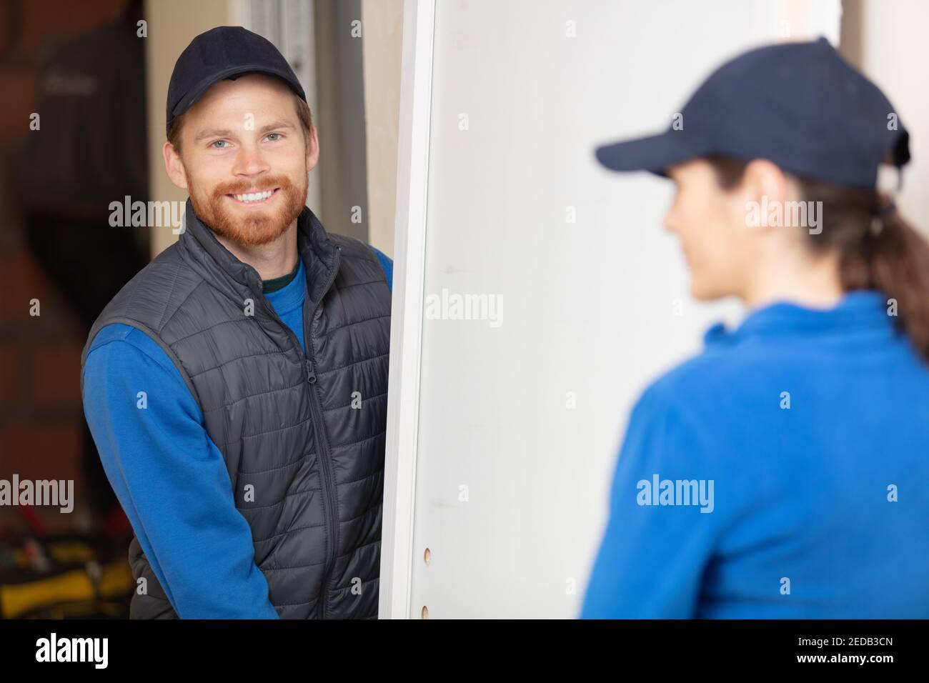 builder on building site working together Stock Photo