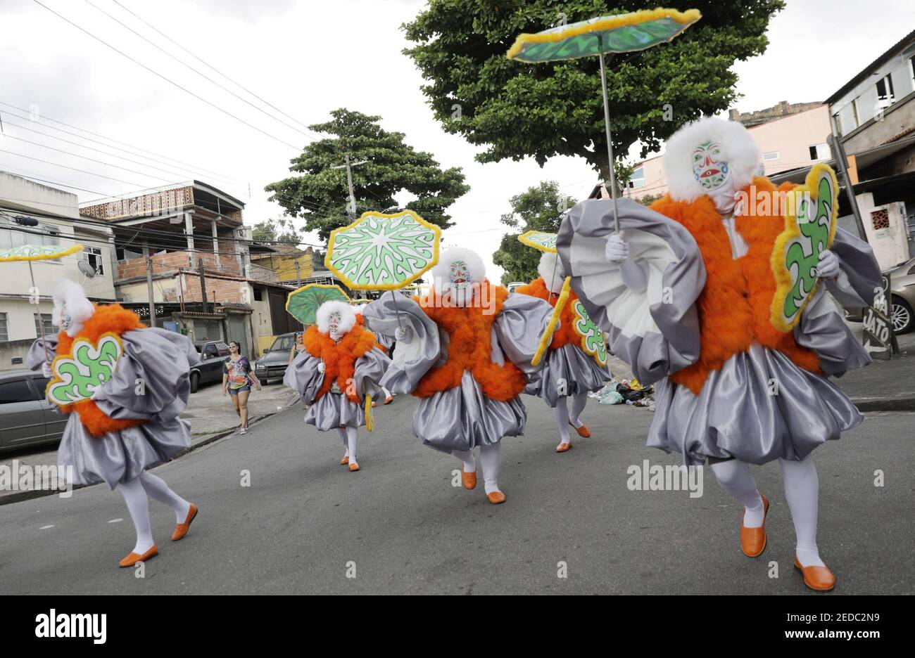 Bate-bola" (slam the ball) revelers perform during the traditional carnival  festivity in the suburb in Rio de Janeiro, Brazil February 14, 2021 despite  Carnival celebrations being cancelled due to the coronavirus disease (