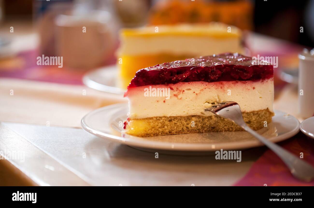 Delicious Cake and the Drinks on Table Stock Photo