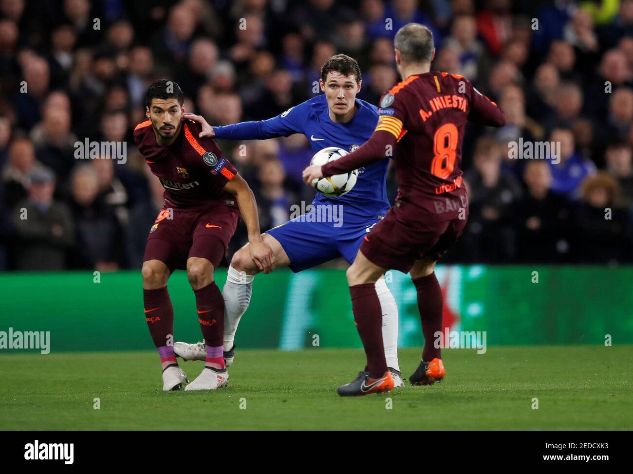 Soccer Football - Champions League Round of 16 First Leg - Chelsea vs FC Barcelona - Stamford Bridge, London, Britain - February 20, 2018   Chelsea's Andreas Christensen in action with Barcelona’s Luis Suarez and Andres Iniesta    REUTERS/Eddie Keogh Stock Photo