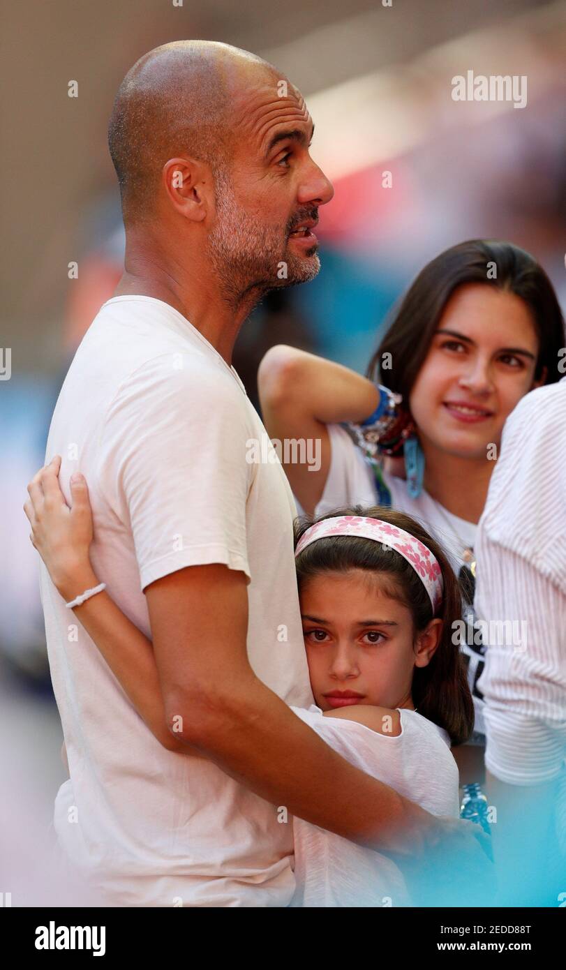 Soccer Football - FA Community Shield - Manchester City v Chelsea - Wembley Stadium, London, Britain - August 5, 2018  Manchester City manager Pep Guardiola celebrates winning the community shield with his wife Cristina Serra and family after the match  Action Images via Reuters/John Sibley Stock Photo