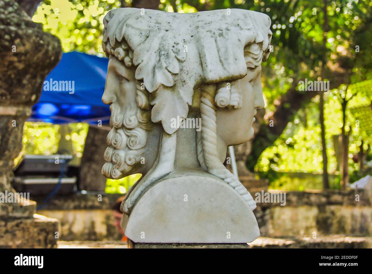 Marble bust of the two faced Roman god, Janus, on the Garden Mound at Villa Vizcaya in Miami, Florida. Stock Photo