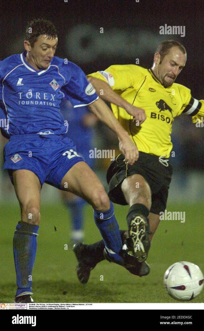 Football - The FA Cup , 1st Round Replay , Burton Albion v Oldham Athletic  , 27/11/02 Burton's Darren Stride is challenged by Oldham's David Eyres  Mandatory Credit:Action Images / Richard Heathcote Stock Photo - Alamy