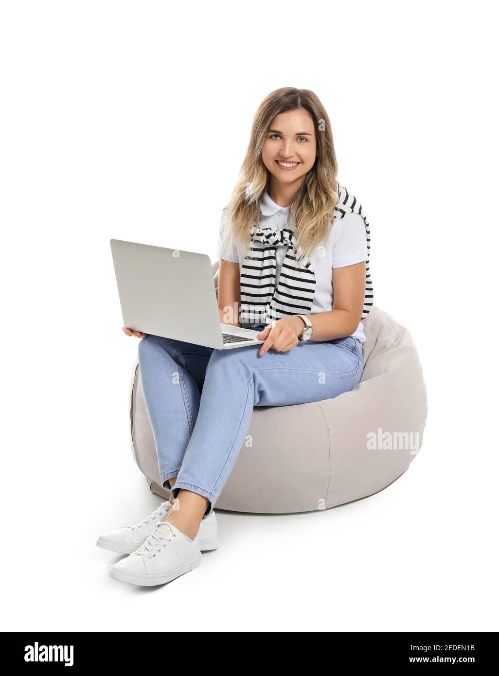 Young woman with laptop on white background Stock Photo - Alamy