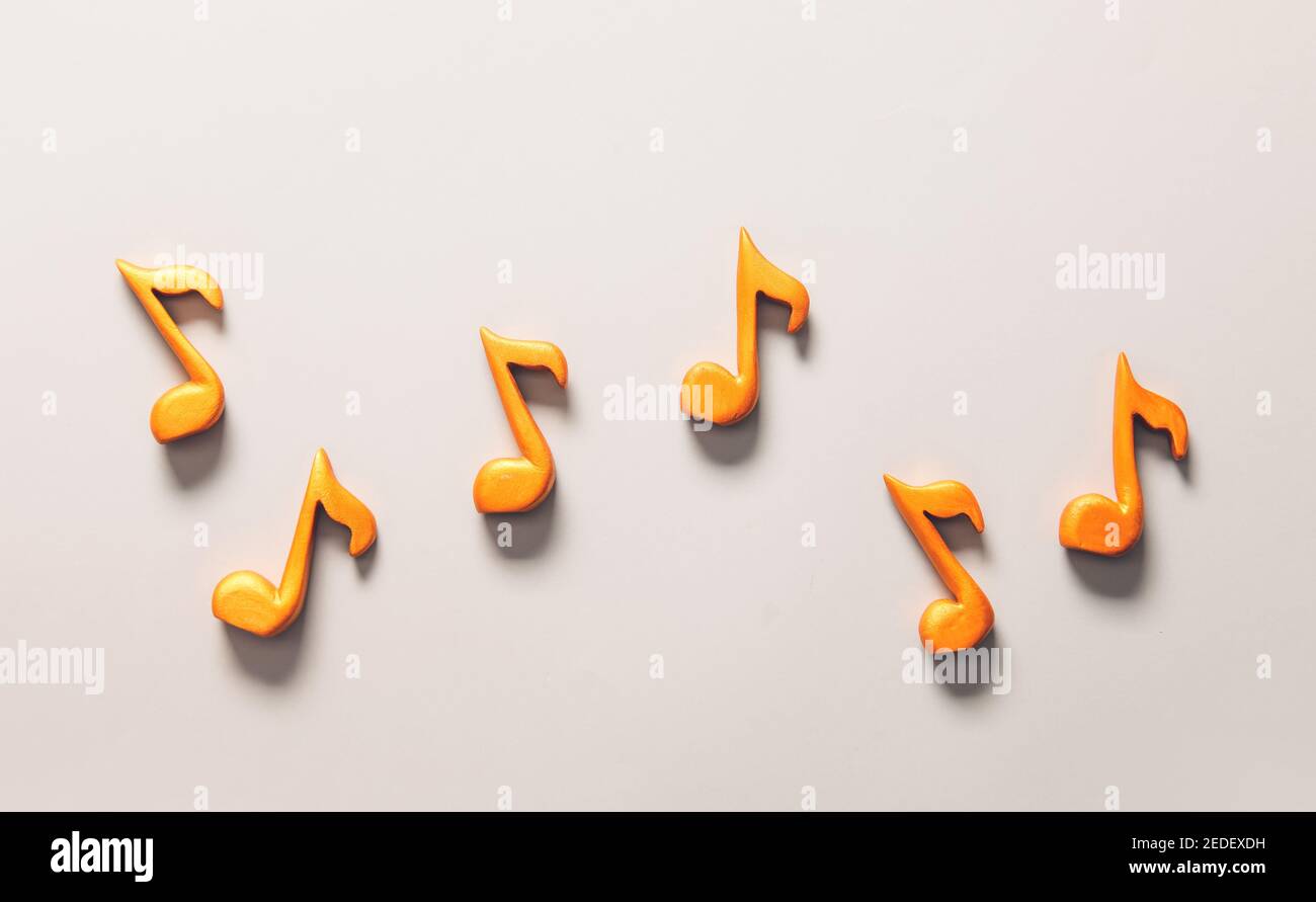 Music notes on light background Stock Photo - Alamy