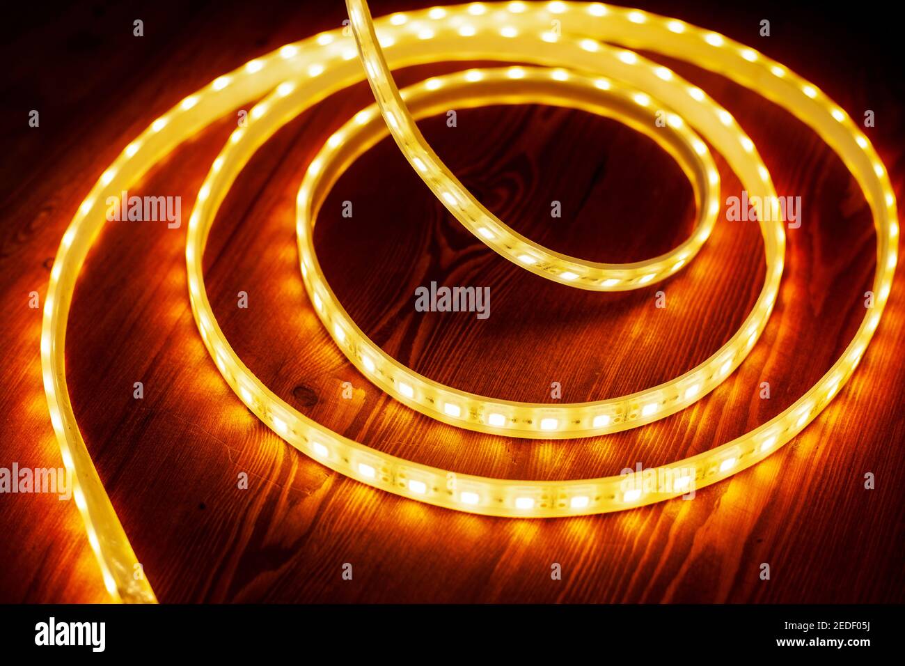 beautiful glowing LED strip of warm light for mounting decorative lighting for homes, offices and other dark places Stock Photo