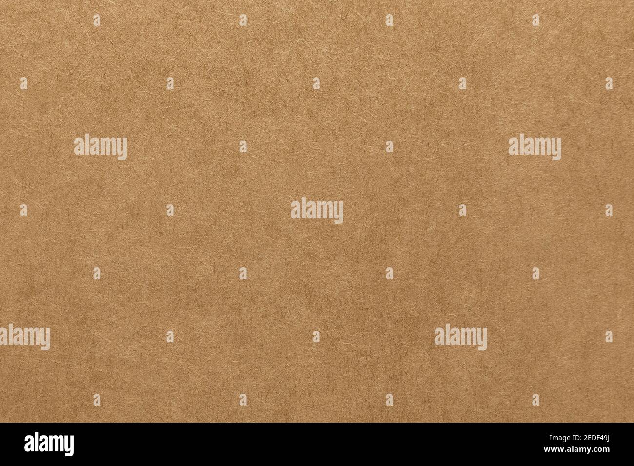 Rough light brown kraft paper with pulp texture for background Stock Photo
