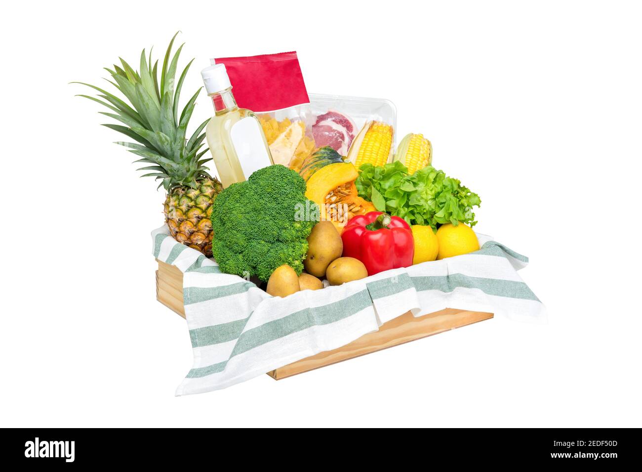 Fresh healthy groceries and vegetables from supermarket inwood tray box isolated on white background Stock Photo