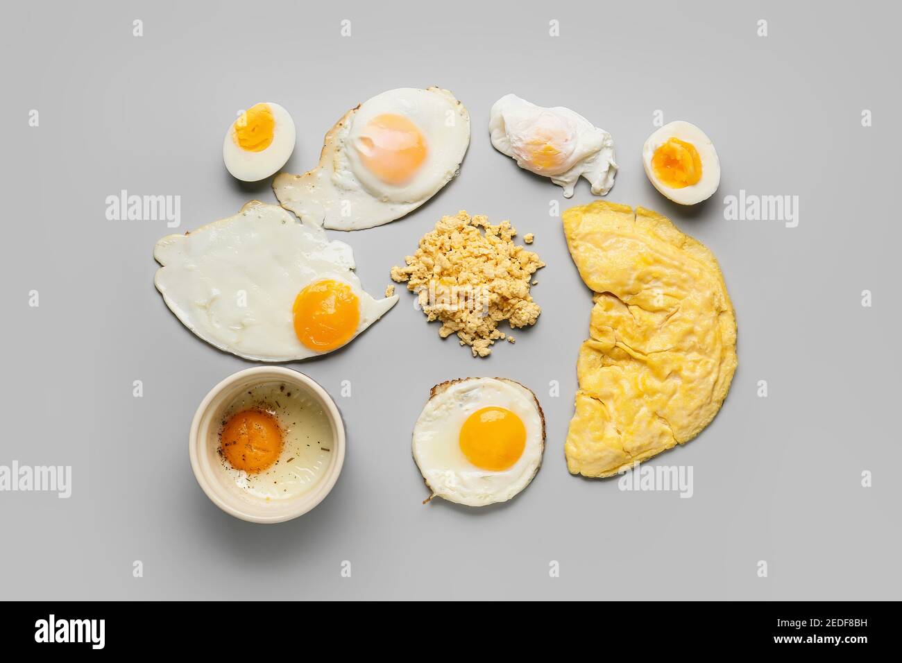 Set of different egg dishes on light background Stock Photo Alamy