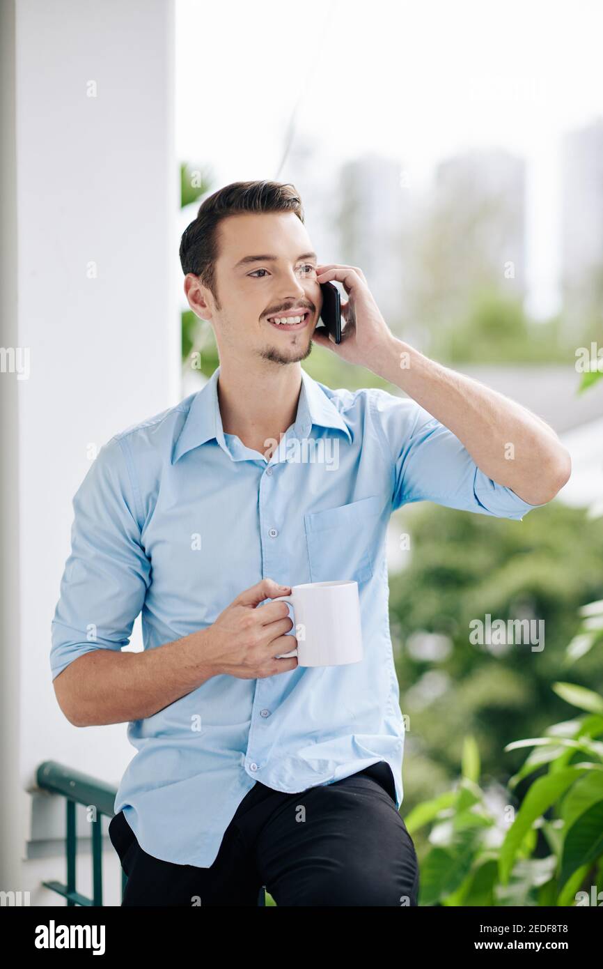 Handsome businessman talking on phone Stock Photo