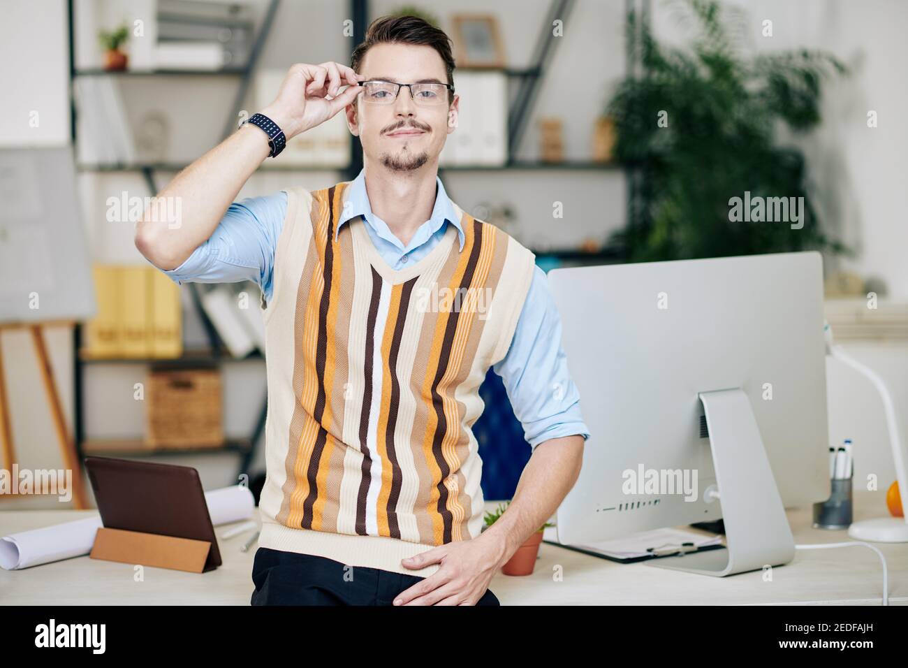 Smiling young businessman Stock Photo