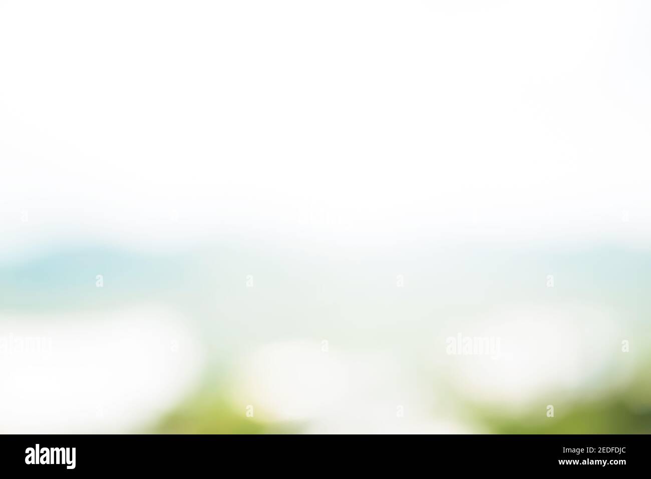 Abstract simple clean natural blur white green bokeh background with light blue shade Stock Photo
