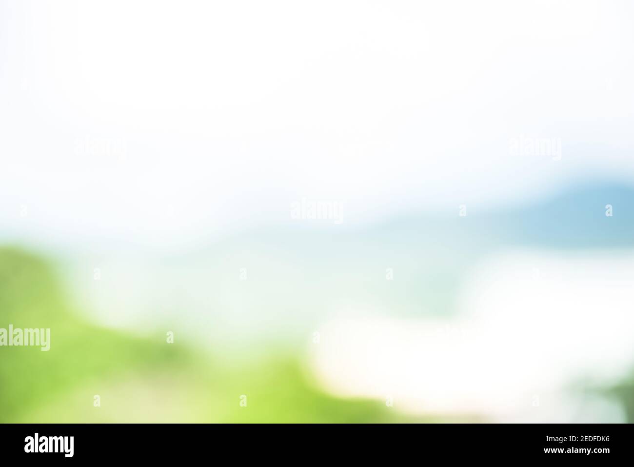 Abstract simple clean natural blur white green bokeh background with light blue shade Stock Photo