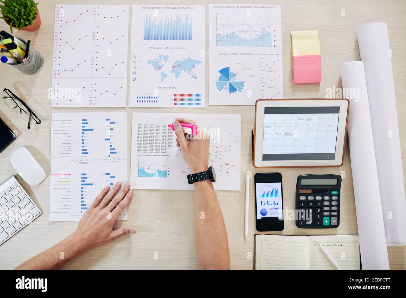 Fnancial analyst highlighinting figures Stock Photo