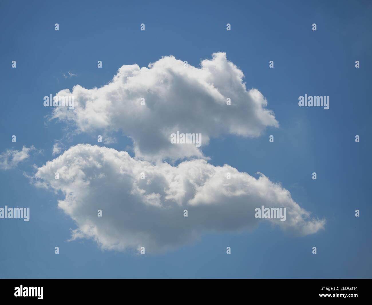Cumulus cloud on beautiful blue sky in day light , Fluffy clouds formations at tropical zone Stock Photo