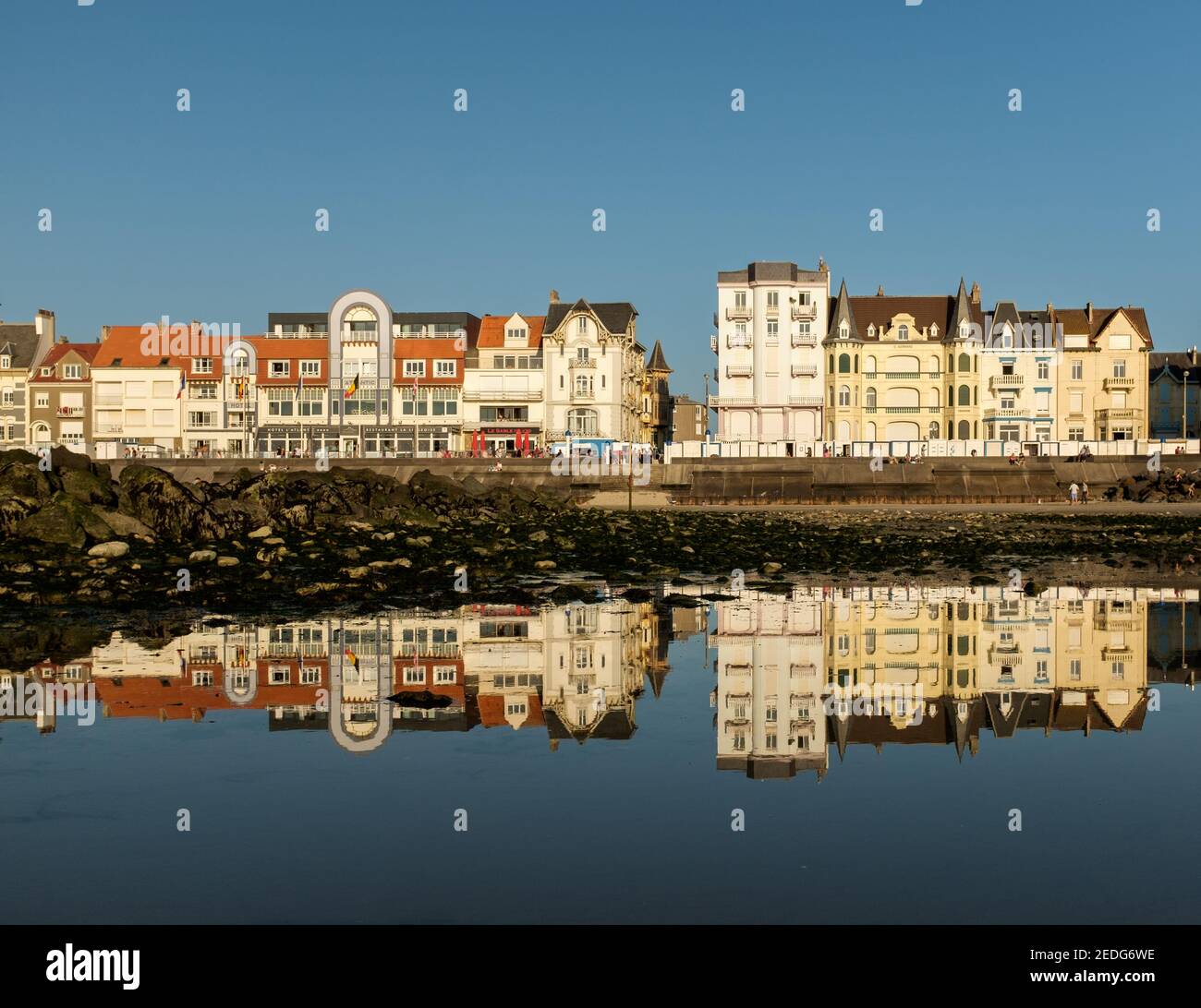 Seafront of Wimereux reflected on the beach of the French Opal Coast Stock Photo