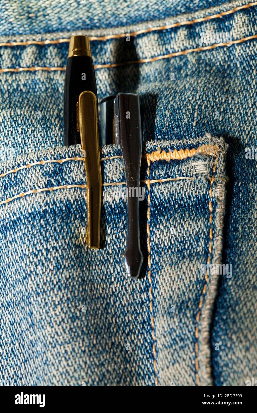 Jean Pant With a Pen on a Pocket Close Up Photo Stock Photo