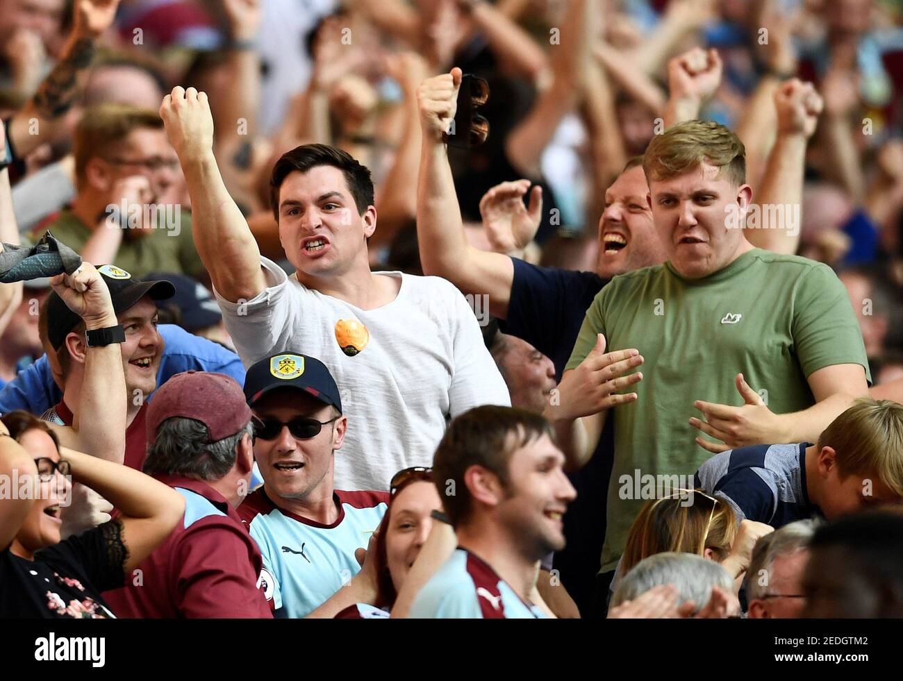 Soccer Football - Premier League - Tottenham Hotspur vs Burnley - London, Britain - August 27, 2017   Burnley fans celebrate   REUTERS/Dylan Martinez    EDITORIAL USE ONLY. No use with unauthorized audio, video, data, fixture lists, club/league logos or 'live' services. Online in-match use limited to 45 images, no video emulation. No use in betting, games or single club/league/player publications. Please contact your account representative for further details. Stock Photo