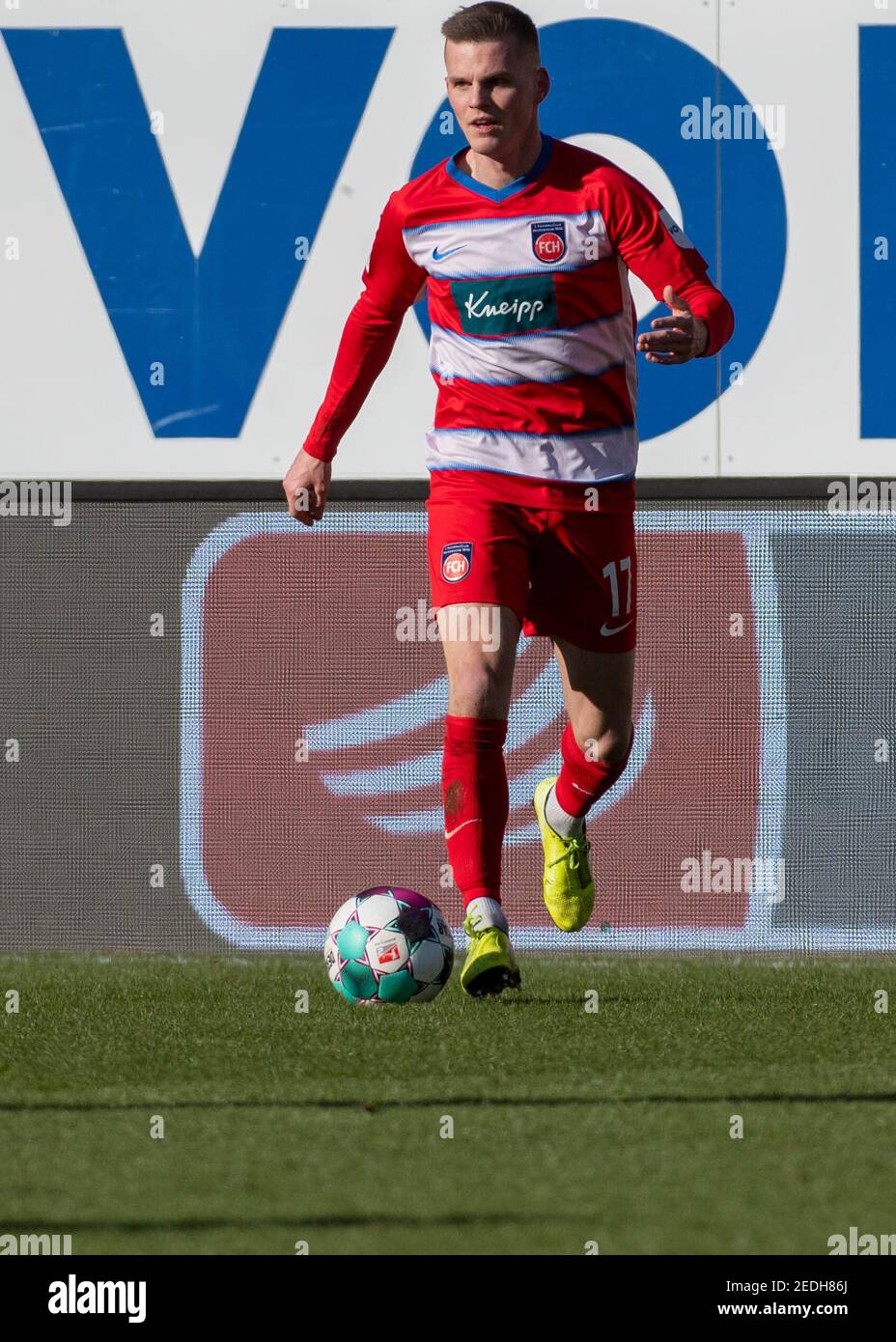 Heidenheim, Germany. 13th Feb, 2021. Football: 2. Bundesliga, 1. FC Heidenheim - Erzgebirge Aue, Matchday 21 at Voith Arena. Heidenheim's Florian Pick plays the ball. Credit: Stefan Puchner/dpa - IMPORTANT NOTE: In accordance with the regulations of the DFL Deutsche Fußball Liga and/or the DFB Deutscher Fußball-Bund, it is prohibited to use or have used photographs taken in the stadium and/or of the match in the form of sequence pictures and/or video-like photo series./dpa/Alamy Live News Stock Photo