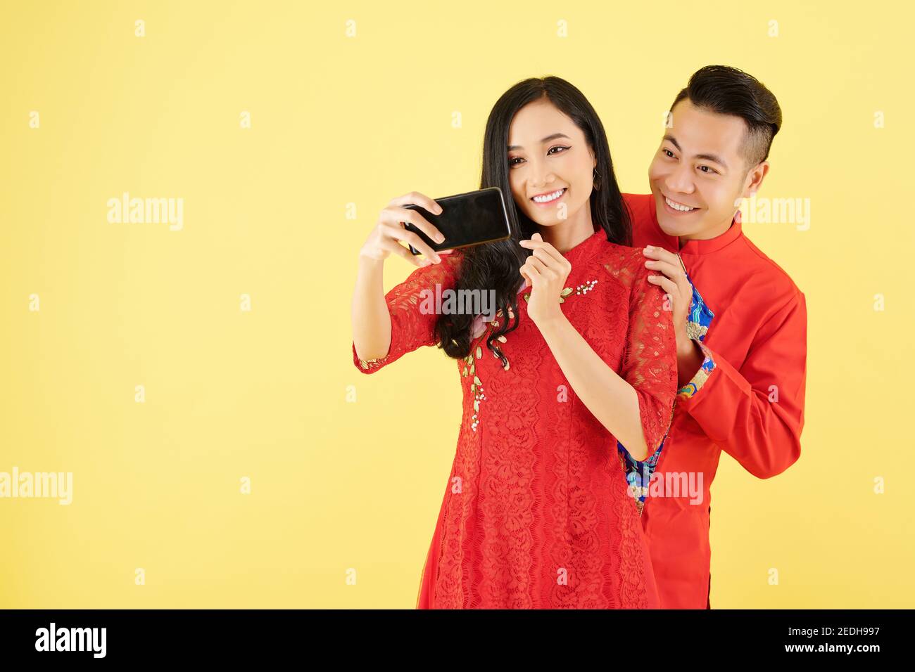 Vietnamese couple taking selfie Stock Photo