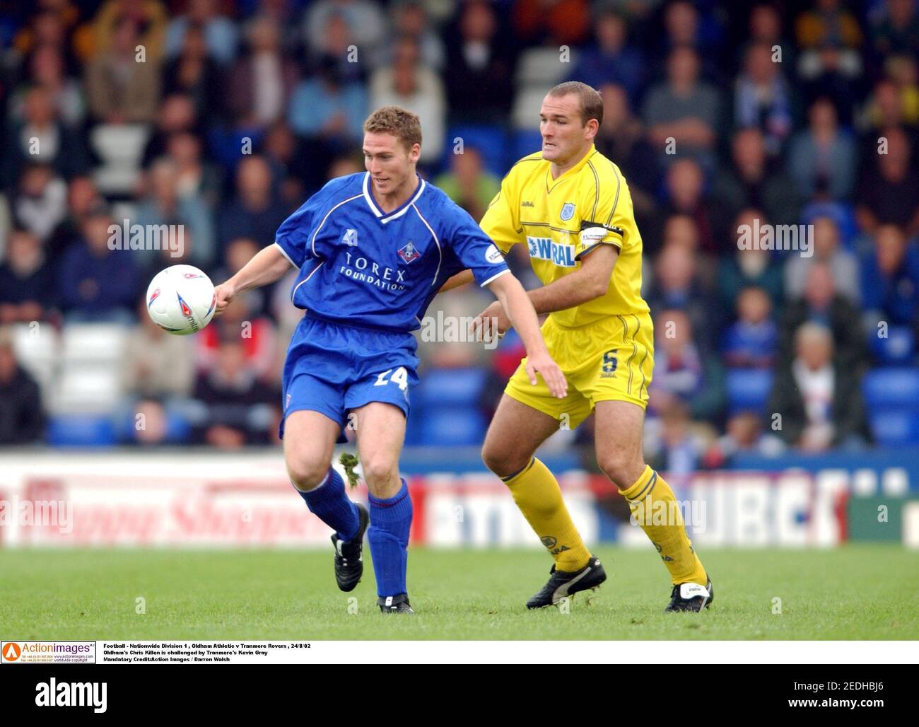 Football - Nationwide Division 1 , Oldham Athletic v Tranmere Rovers , 24/8/02  Oldham's Chris Killen is challenged by Tranmere's Kevin Gray  Mandatory Credit:Action Images / Darren Walsh Stock Photo