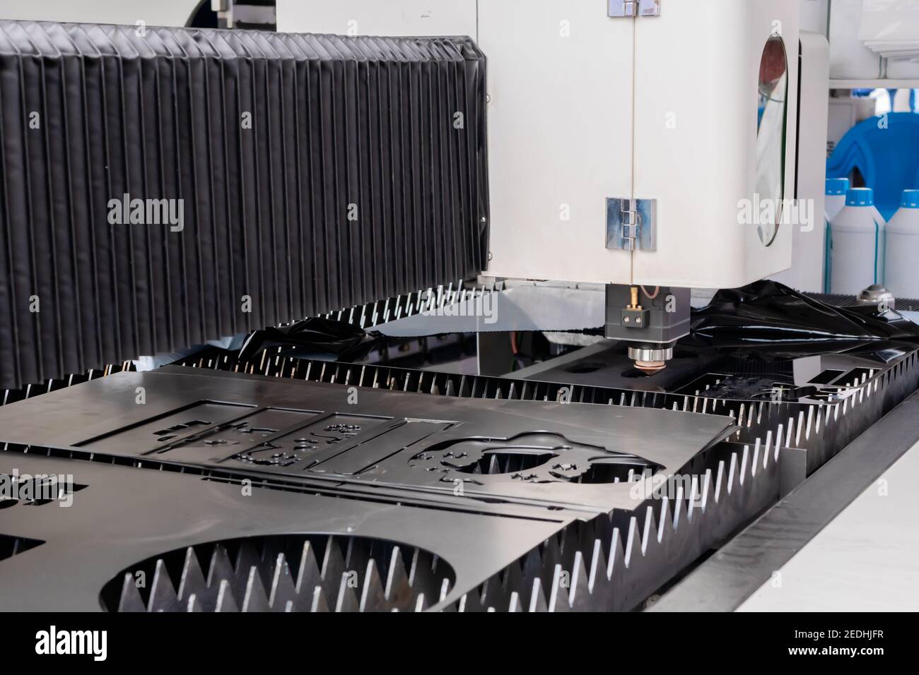 Laser cutting machine working with sheet metal at metalworking