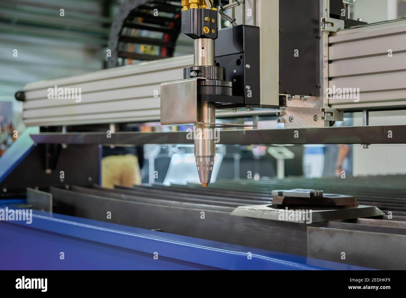 Plasma cutting machine working with sheet metal at metalworking