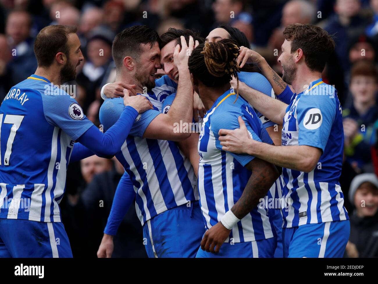 Soccer Football - Premier League - Brighton & Hove Albion vs Arsenal - The American Express Community Stadium, Brighton, Britain - March 4, 2018   Brighton's Lewis Dunk celebrates scoring their first goal with team mates    REUTERS/Eddie Keogh    EDITORIAL USE ONLY. No use with unauthorized audio, video, data, fixture lists, club/league logos or 'live' services. Online in-match use limited to 75 images, no video emulation. No use in betting, games or single club/league/player publications.  Please contact your account representative for further details. Stock Photo