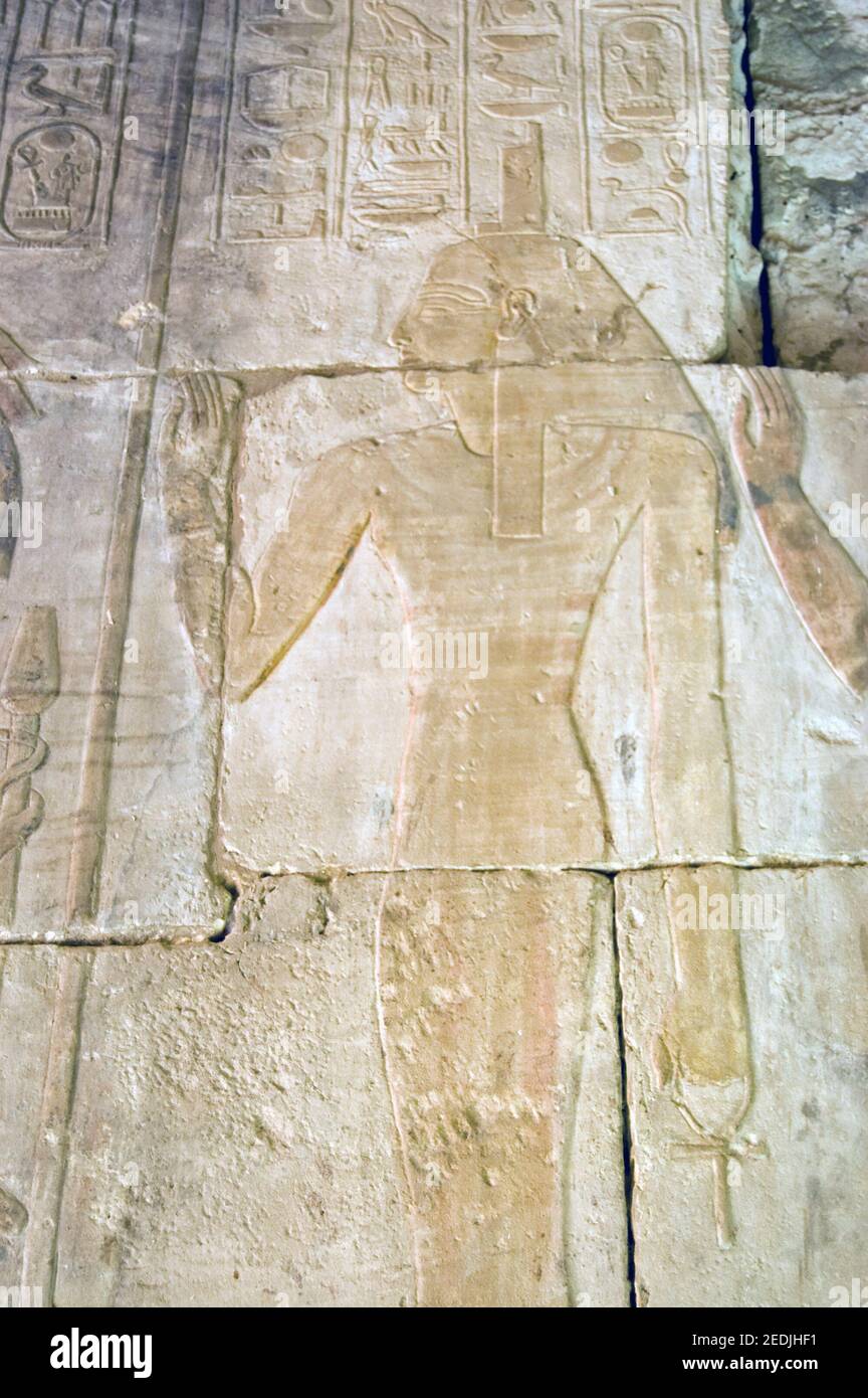 Ancient Egyptian Goddess Isis. Stone carving on a wall of the Temple of Seti I on the West Bank
