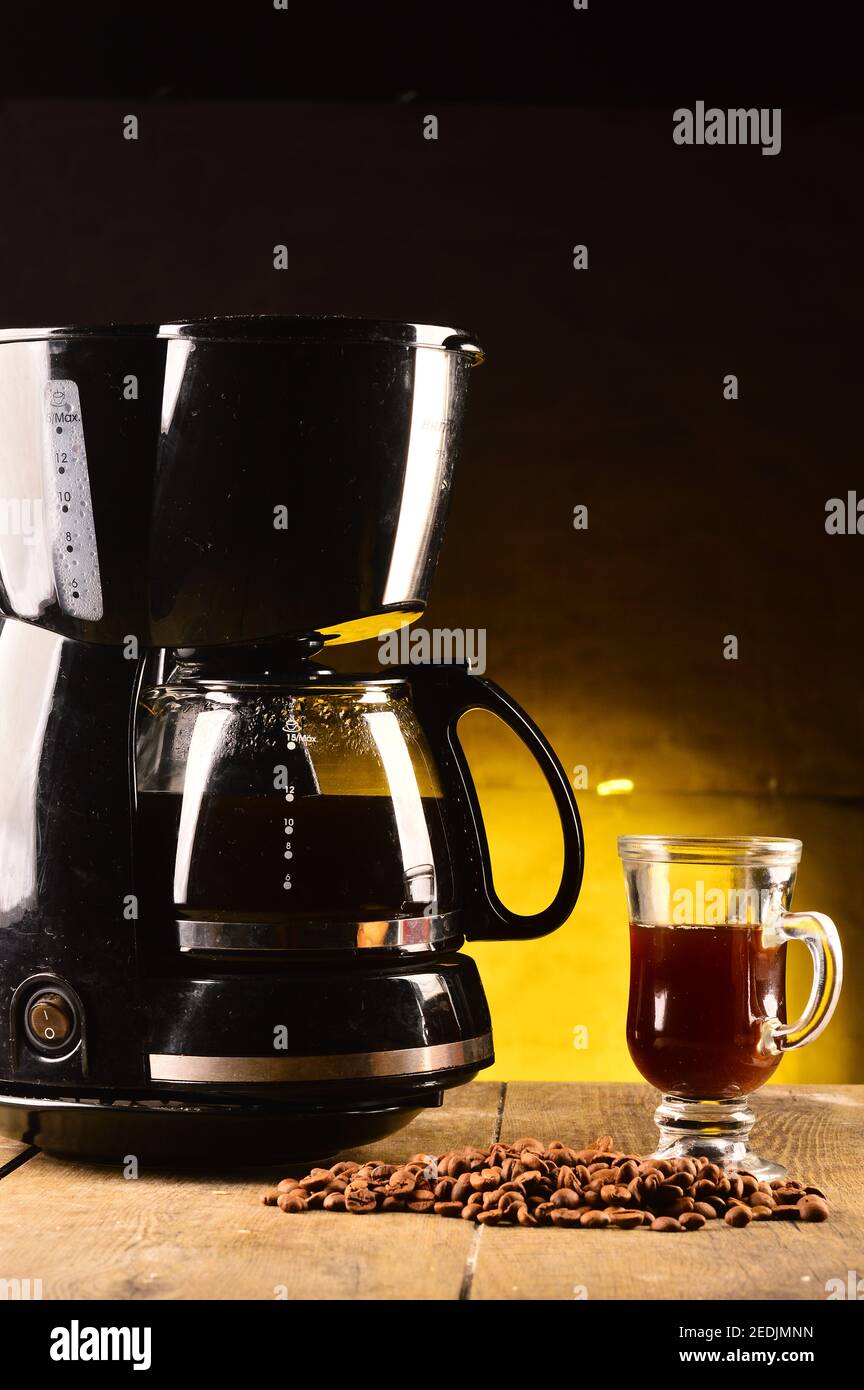Coffee machine on the table Stock Photo Alamy