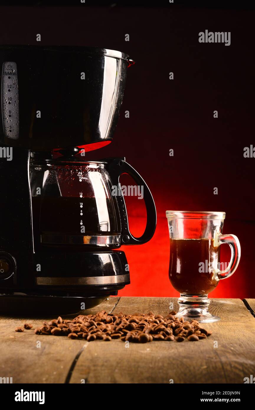 Coffee machine on the table Stock Photo Alamy