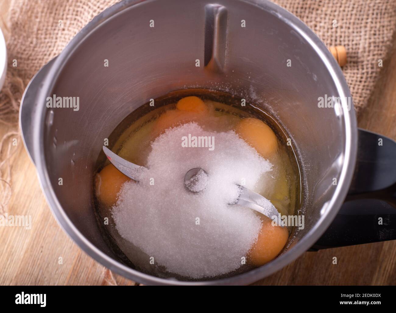 eggs and sugar in mixer preparing for whipping Stock Photo Alamy