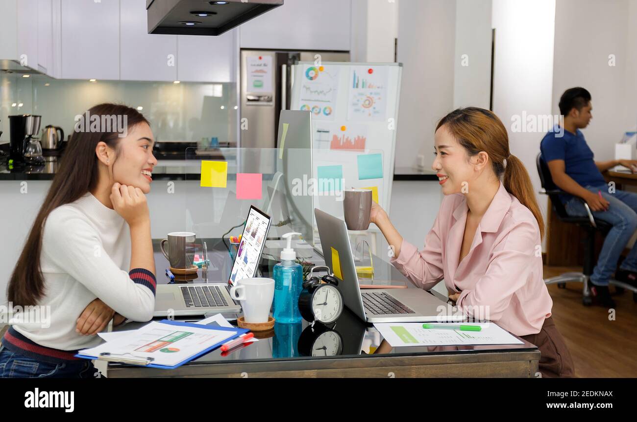 Asian Business Team brainstorm meeting. Business start up working at