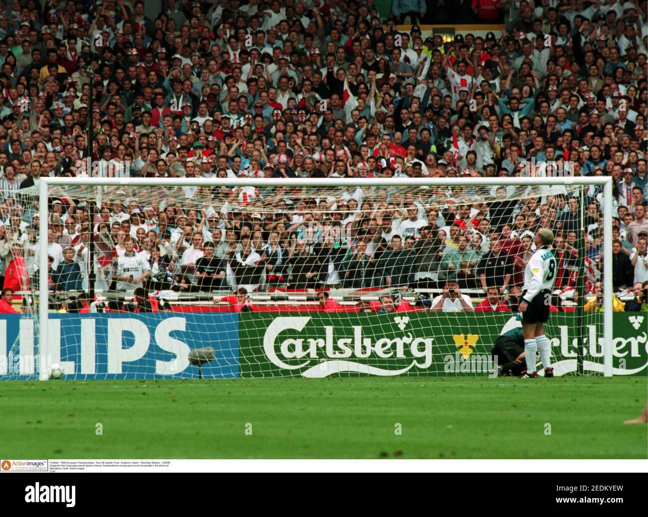 Football - 1996 European Championships - Euro 96 Quarter Final - England v Spain - Wembley Stadium - 22/6/96 England's Paul Gascoigne sends Spain's Antonio Zubizarreta the wrong way to score his penalty in the shoot out Mandatory Credit: Action Images FILM Stock Photo