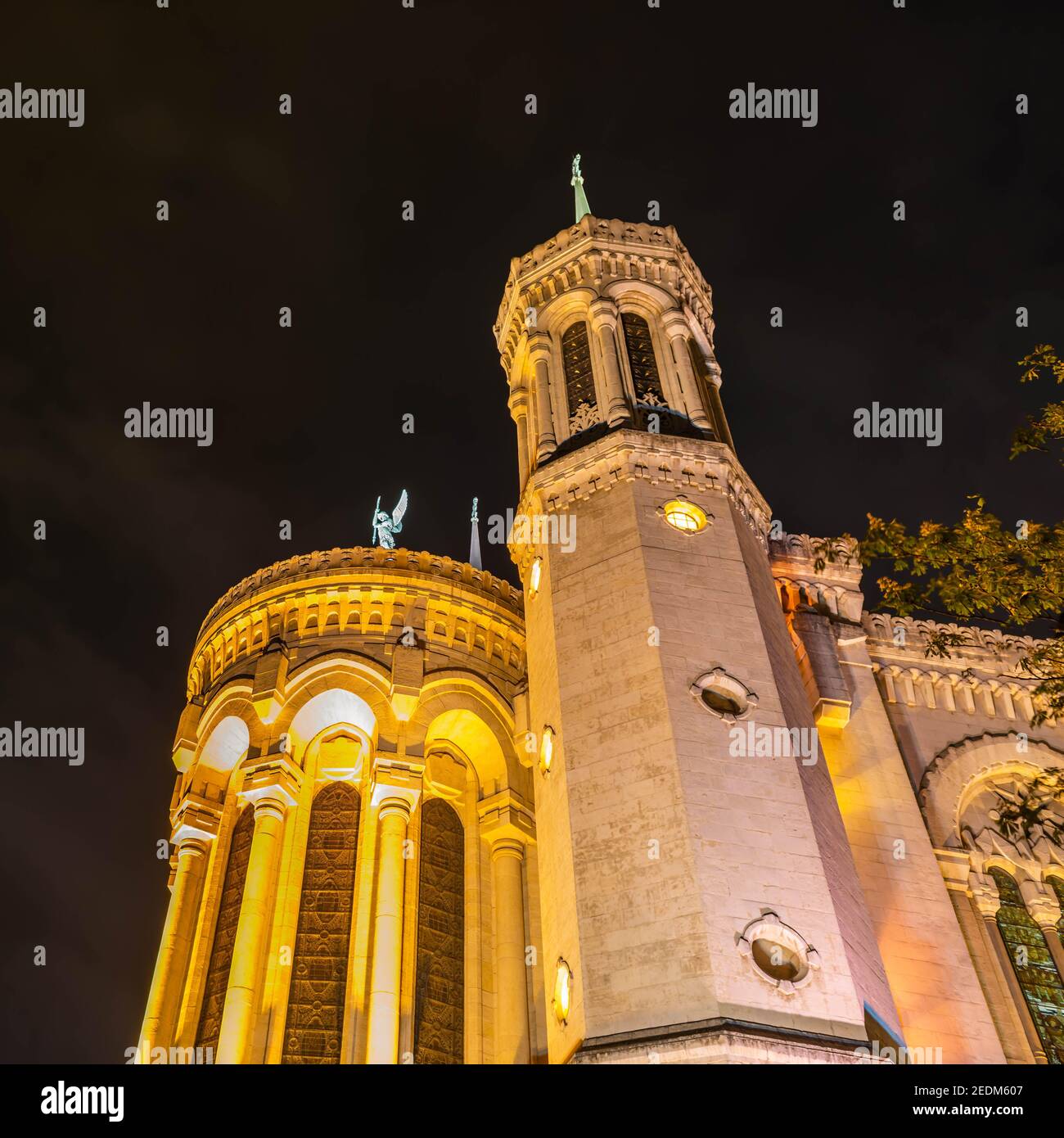 The rear of the Notre Dame de Fourviere Basilica at night in Lyon, in the Rhone, France Stock Photo