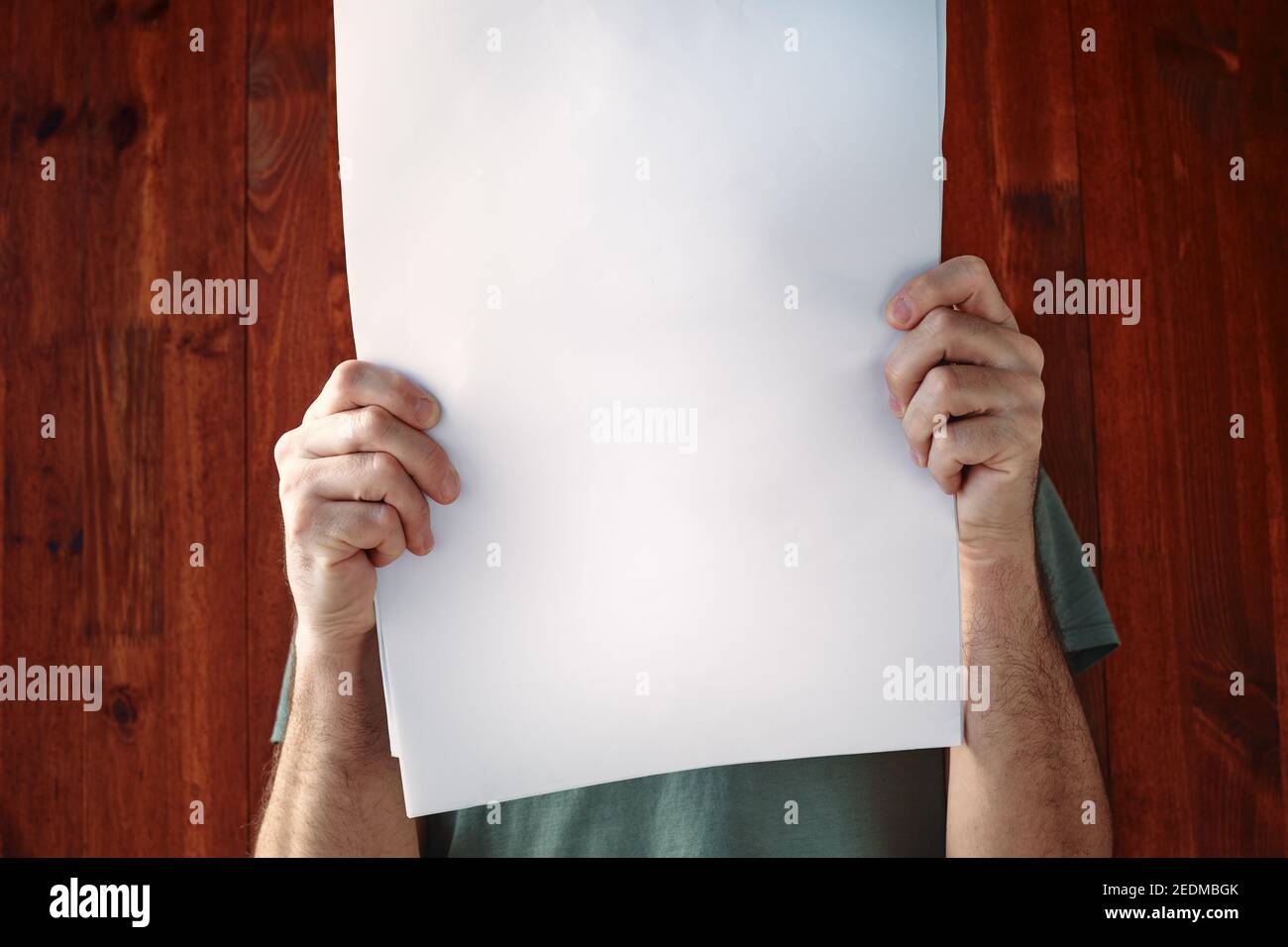 Miercoles (Wednesday In Spanish) Sign On White Paper. Man Hand Holding  Paper With Text. Isolated On Skyscraper Background. Business Concept. Stock  Photo Stock Photo, Picture and Royalty Free Image. Image 77689977.