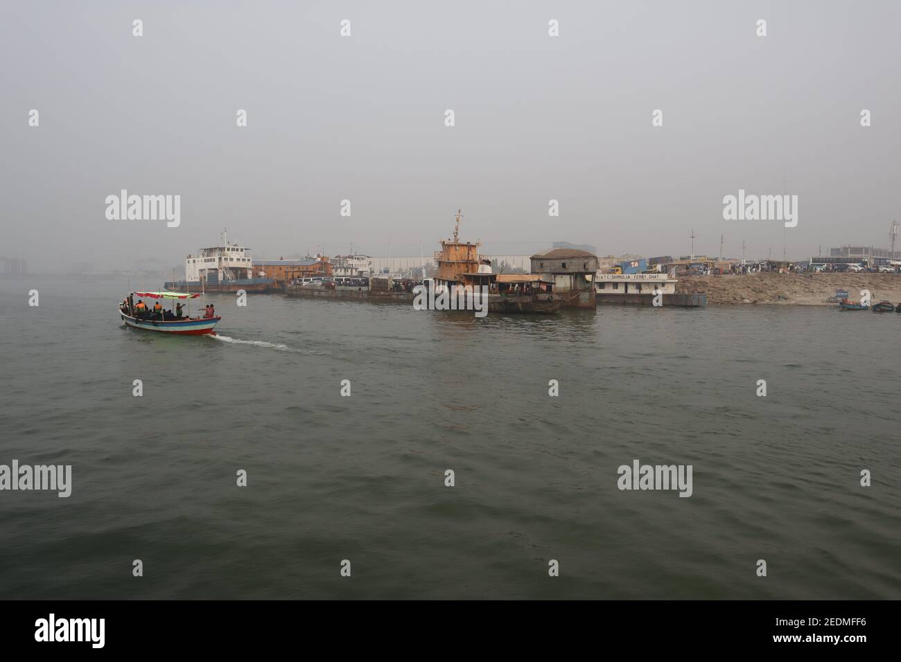 Bangladesh is a land of rivers. Water transport is one of the main  transport systems here. Lauch, Ferry, Boat and Speed boat is the main vehicle here. Stock Photo